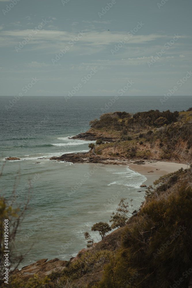 Beach and rocky coastal views near Connor Hurley Point as seen from Razorback Lookout.