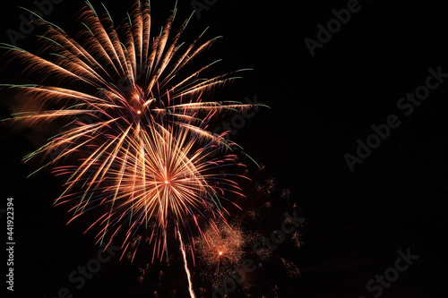 Fireworks. Beautiful display of colorful fireworks on a night sky background.Light abstract