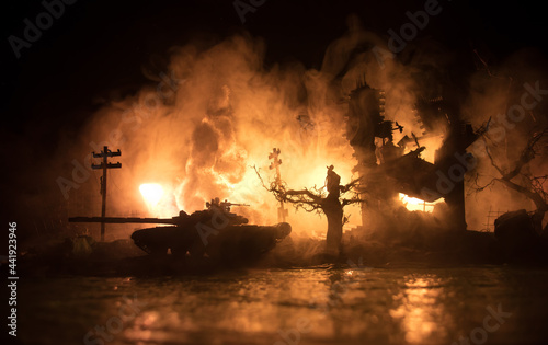 War Concept. Military silhouettes fighting scene on war fog sky background  World War Soldiers Silhouette Below Cloudy Skyline At night. Battle in ruined city.