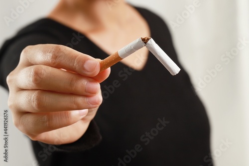 Women break cigarettes and quit this addiction permanently. world tobacco day perspective