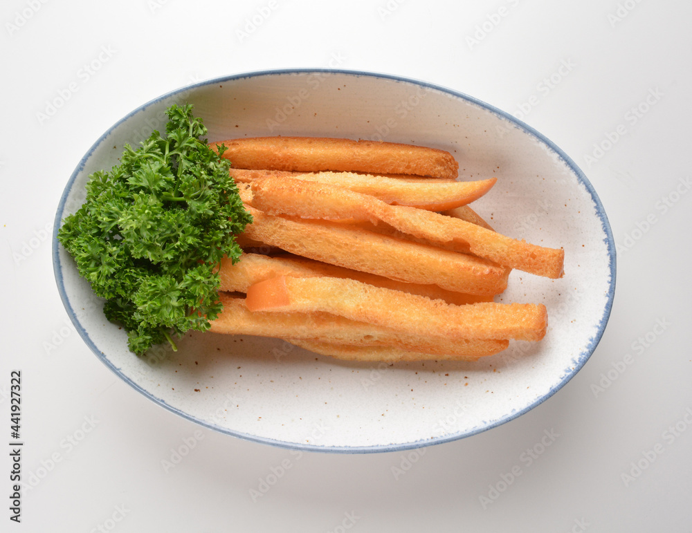 deep fried crispy long stick bread cookies pastry bakery French fries fast food snack in bowl on white table restaurant asian cafe halal chinese banquet menu deep fried crispy long stick bread cookies pastry bakery French fries fast food snack in bowl on white table restaurant asian cafe halal chinese banquet menu