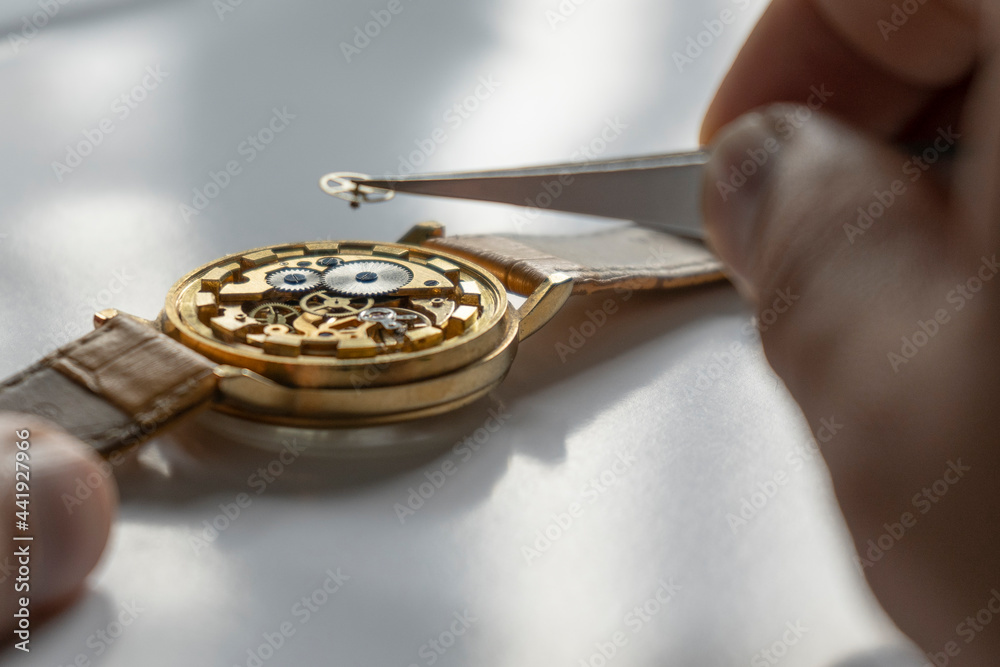 Watchmaker repair mechanical watches. Gears repair. Watch repair process Watchmaker repair mechanical watches. Gears repair. Watch repair process