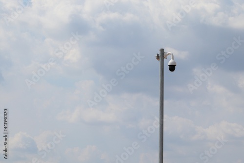Closed circuit camer (CCTV) on the sky background,Thailand