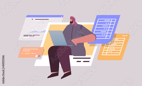 arab businessman analyzing data on laptop business analyst making analytics report working process concept