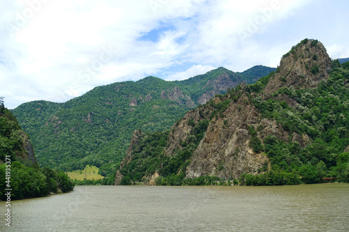 Landscape of Olt Valley with Olt river and Cozia Mountains in Romania © Rechitan Sorin