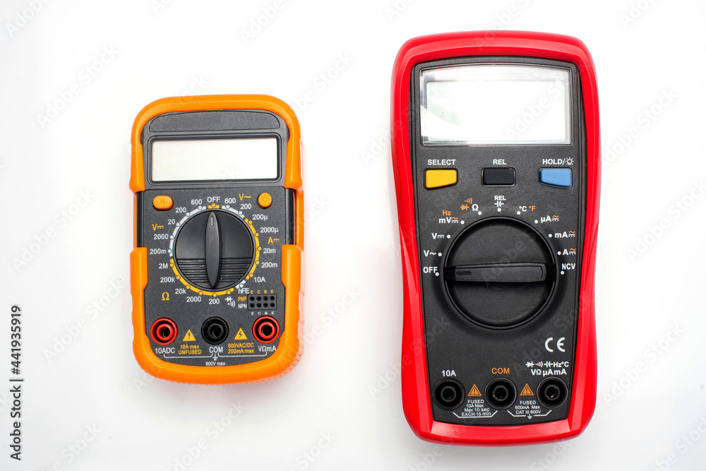 Electronic digital multimeter isolated on white with probes. Digital