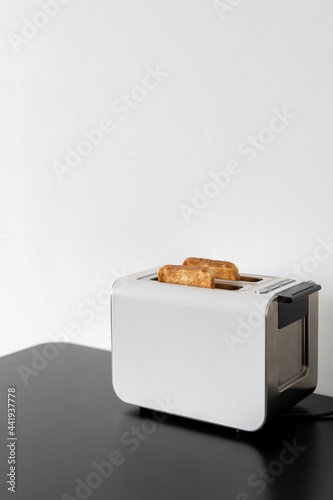 Toaster with two slices of bread for sandwiches