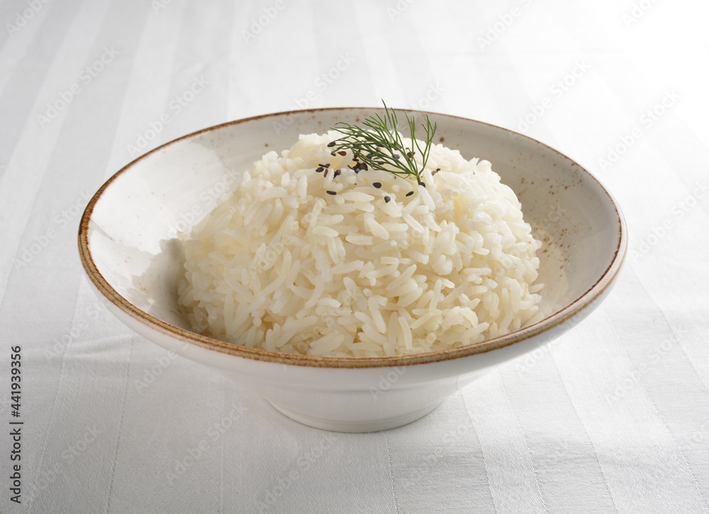 steamed fragrant white jasmine rice in Japanese ceramic bowl asian halal menu steamed fragrant white jasmine rice in Japanese ceramic bowl asian halal menu