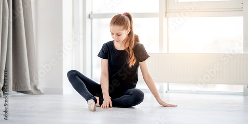 Girl in ballet training studio