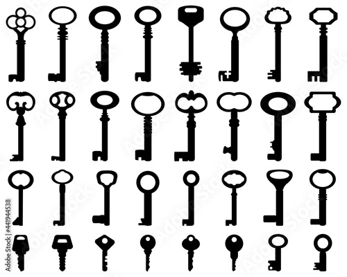 Set of black silhouettes of door keys on a white background