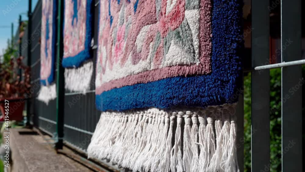 Textile industry concept, manufacturing of handmade oriental wool carpets with ethnic patterns. Traditional antique carpets decoration, geometric ornaments on fabric texture. Collection of handmade