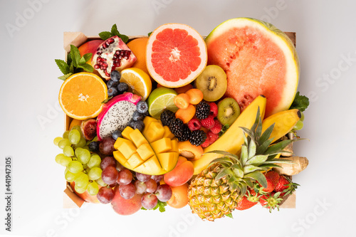 Fototapeta Naklejka Na Ścianę i Meble -  The set of tropical fruits stacked for delivery