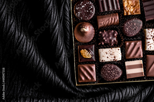 Billede på lærred Swiss chocolates in gift box, various luxury pralines made of dark and milk organic chocolate in chocolaterie in Switzerland, sweet dessert food as holiday present and premium confectionery brand