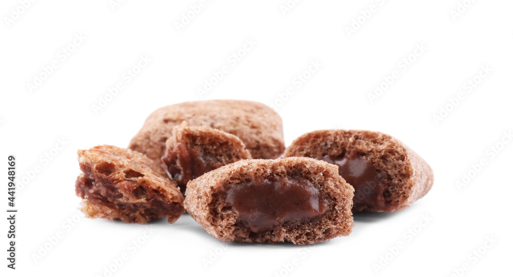 Broken chocolate corn pads on white background Broken chocolate corn pads on white background