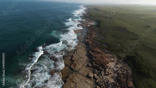 Aerial view of the rugged, rocky beach coastline of Mkambati Nature reserve, Eastern Cape, South Africa photo