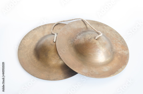 cymbals, an old Thai musical instrument isolated on white background.