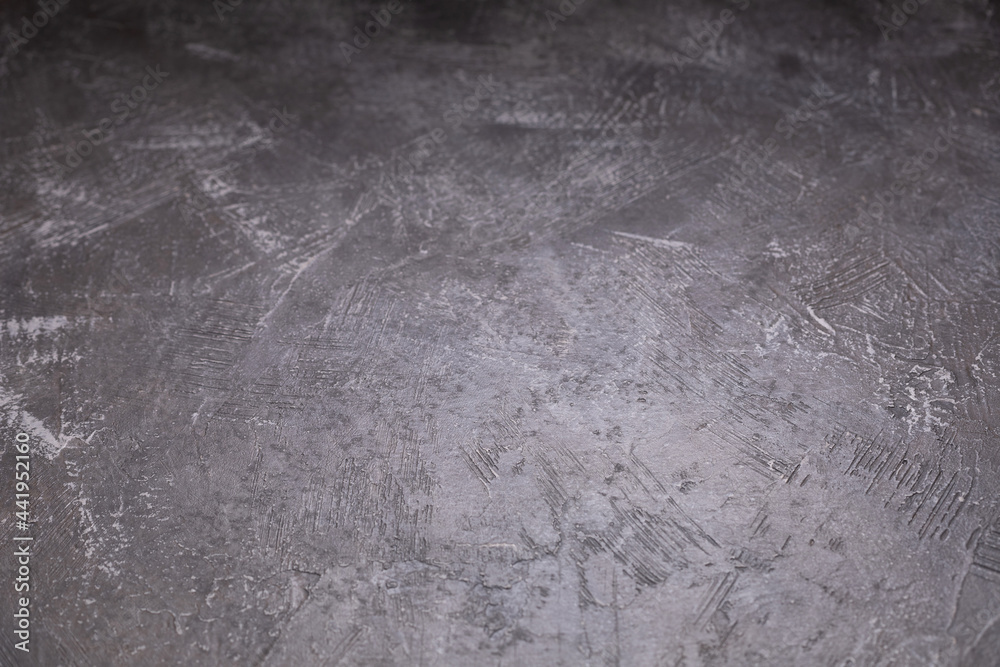 Naklejka premium Abstract painted background texture as table top. Plaster surface