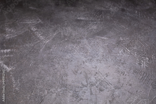 Abstract painted background texture as table top. Plaster surface