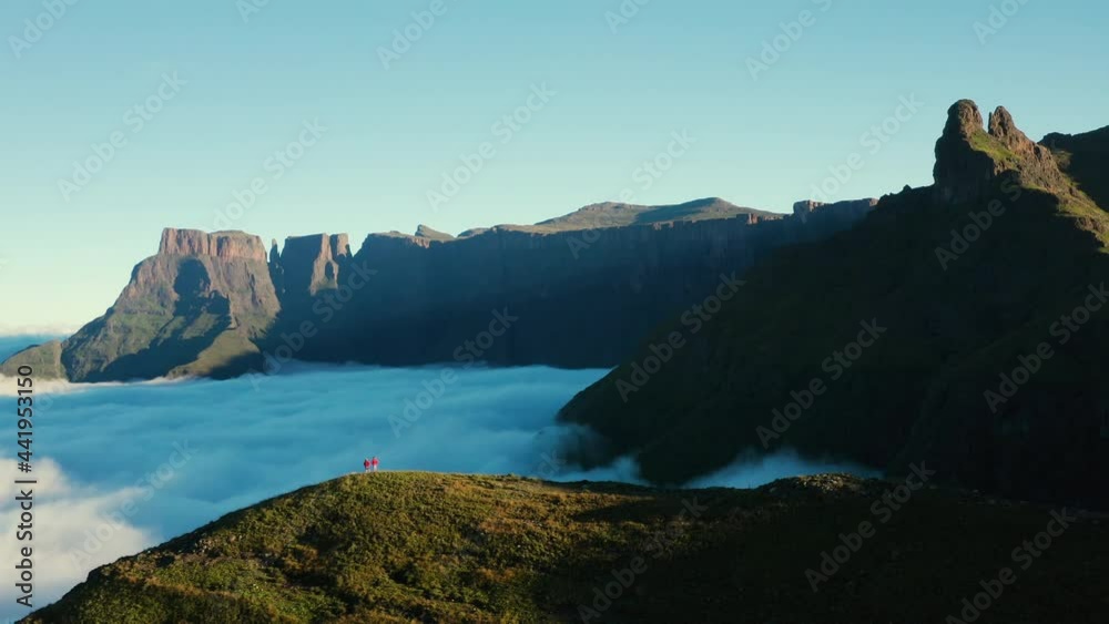Aerial view of tourists admiring the spectacular Amphitheatre, Drakensberg, KwaZulu-Nata,South Africa