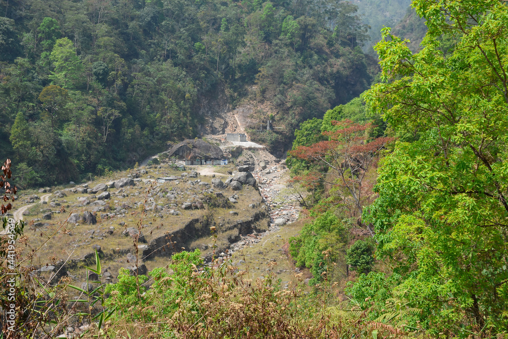 Aerial view view of himalayan rivulet in the forest.