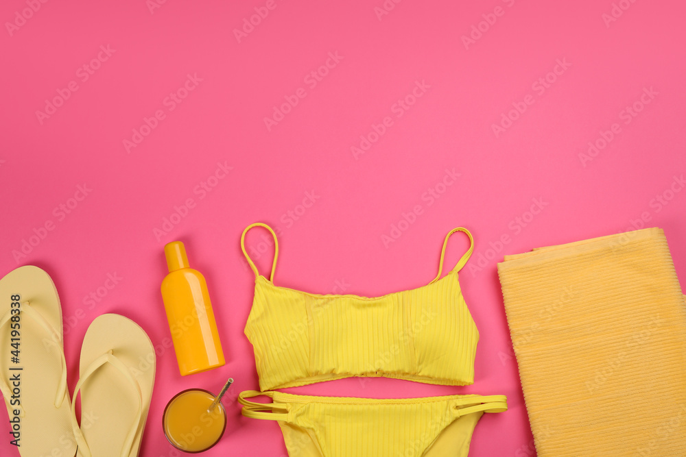 Flat lay composition with beach objects on pink background, space for text Flat lay composition with beach objects on pink background, space for text
