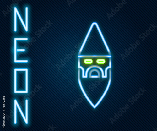 Glowing neon line Wizard warlock icon isolated on black background. Colorful outline concept. Vector