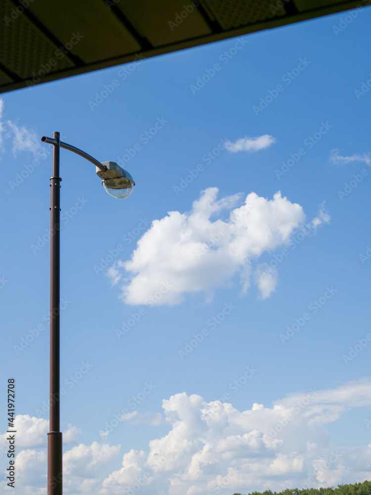 The street lighting pole was photographed from under the canopy of the terrace.