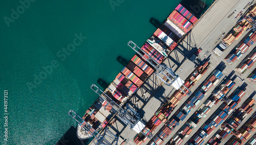 Aerial top view Logistics and transportation of Container Cargo ship and Cargo import/export