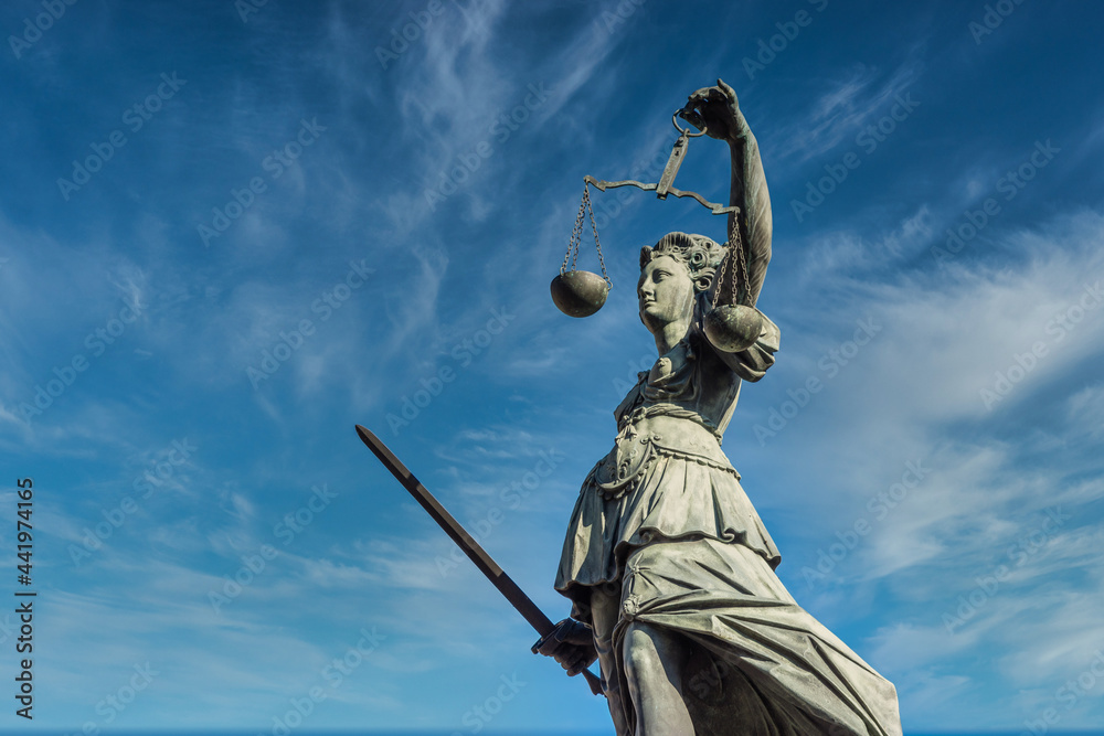 Justitia monument in Frankfurt roemerberg low angle Justitia monument in Frankfurt roemerberg low angle