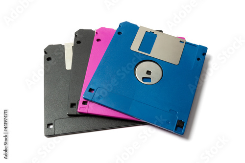 Old floppy disks on white background