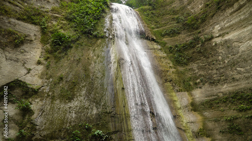 Dao waterfalls in a mountain gorge in the tropical jungle  Philippines  Cebu. Waterfall in the tropical forest.