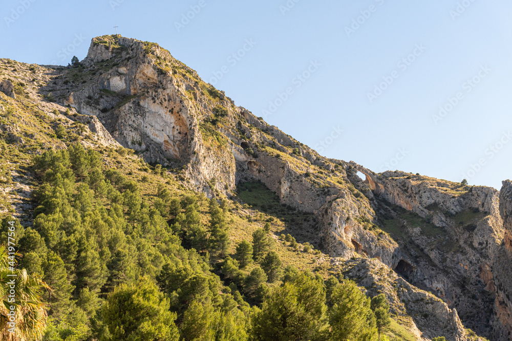 Naklejka premium Natural mountain landscape, with the arch of Santa Lucía de Penáguila, Alicante (Spain)