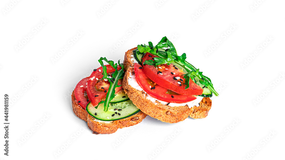 Bruschetta with cream cheese and vegetables isolated on a white background. Toasts isolated. Sandwich isolated. Sandwich with vegetables and cheese.