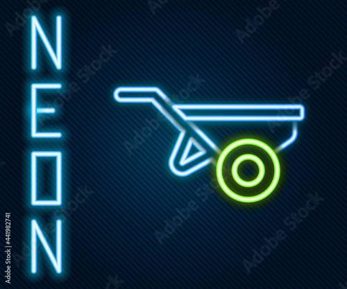 Glowing neon line Wheelbarrow with dirt icon isolated on black background. Tool equipment. Agriculture cart wheel farm. Colorful outline concept. Vector