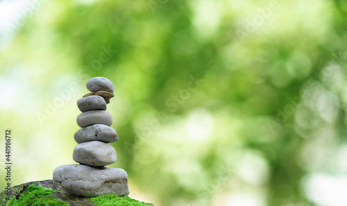 Zen Stone Balance Spa Outdoor Beautiful Green Bokeh Background