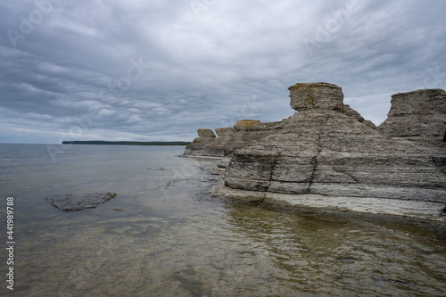 A beautiful limestone formation with a dramatic sky in the background. Picture from the Baltic Sea