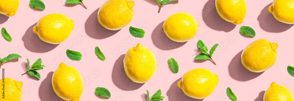 Fresh yellow lemons with mints overhead view Fresh yellow lemons with mints overhead view