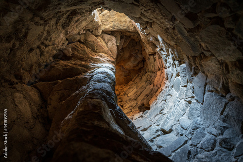 Old antique stone spiral staircase to belfry