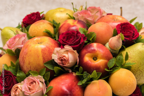 Gift floral fruit bouquet on light background
