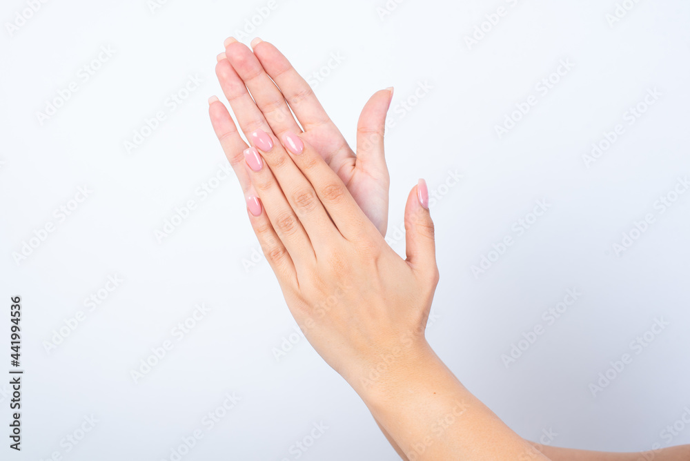 Obraz premium hands with manicure clapping, celebrating something amazing. 