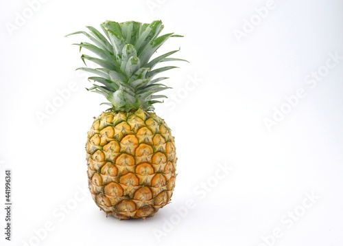 fresh yellow pineapple isolated on white background