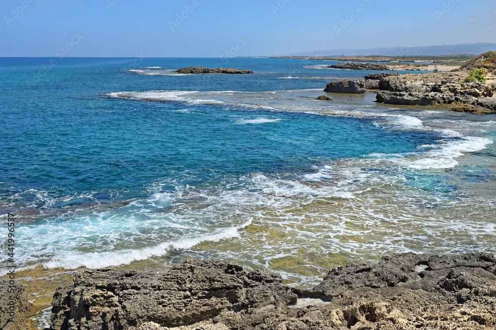 Hof Dor - Beach Nature Reserve, picturesque beach, a coastal strip with more bays and inlets and unusual geological formations in northern Israel Hof Dor - Beach Nature Reserve, picturesque beach, a coastal strip with more bays and inlets and unusual geological formations in northern Israel
