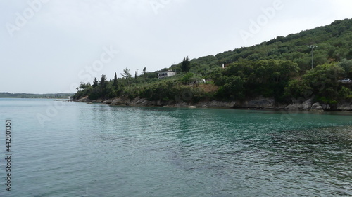 Wallpaper Mural Tropical land and turquoise ocean in greece taken from the sea Torontodigital.ca