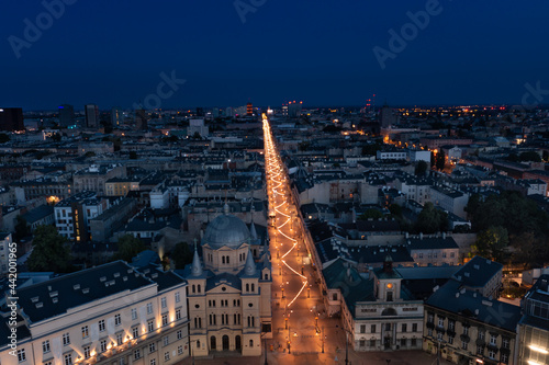 Beautifully illuminated Piotrkowska Street at night. Lodz, Poland.