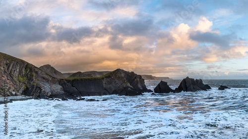 Stunning landscape image of view from Hartland Quay in Devon England durinbg moody Spring sunset