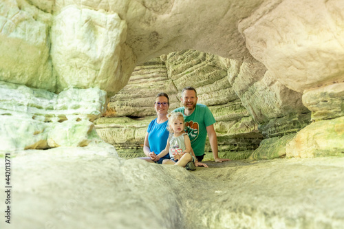Family of mom, dad and daughter at Starved Rock State Park in Utica, Illinois photo