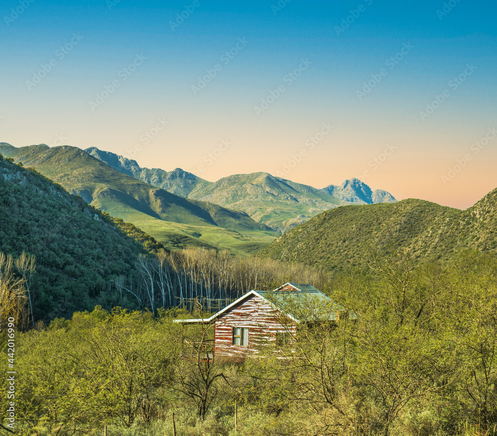 Rustic abandoned wooden hut in the mountain oudtshoorn Western Cape South Africa