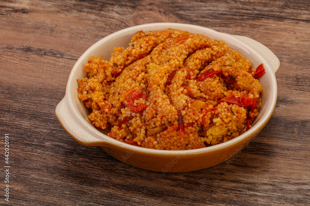 Couscos with tomato and chicken Couscos with tomato and chicken