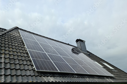 Принти на полотні View at new solar panels on the roof of a residential house.