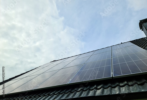 Принти на полотні View at new solar panels on the roof of a residential house.